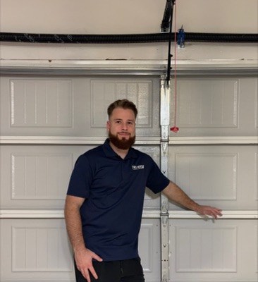 Andrew White, owner of TrueSafe Garage Door Repair in Garland, TX